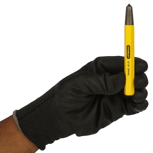 5 sixteenth inch by 4-1/2 inch center punch in a person's hand.